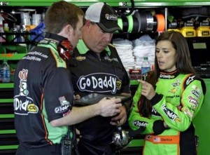 Danica talks to her crew members during race practice