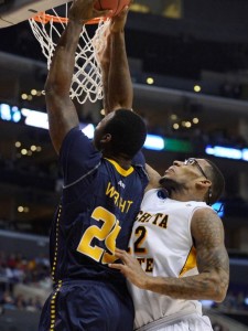 Shockers forward Carl Hall defends against La Salle's Jerrell Wright