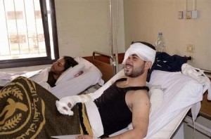 A rebel fighter, allegedly suffering from chem weapon effects, in an Aleppo hospital