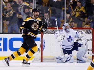 Bruins defenseman Chara reacts to a goal during Boston's third-period rally